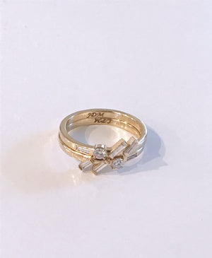 A Picture of a Bexon Jewelry Custom Redesign Rings Featuring Baguettes and Round Diamonds in 14k recycled yellow gold bexonjewelry.com