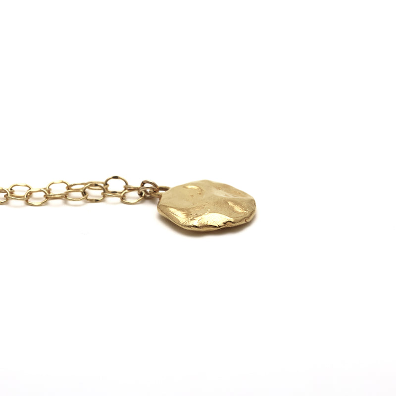 A closeup of the Restituo Necklace in Gold Vermeil by Bexon Jewelry